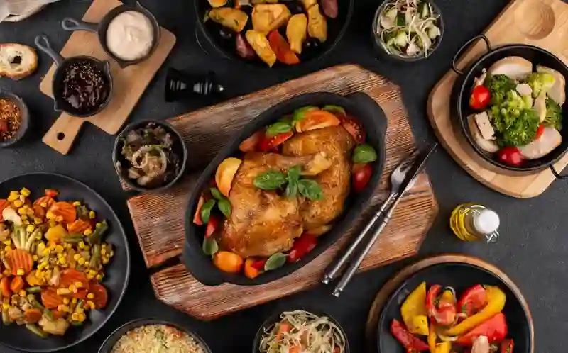 A Restaurant table full of dishes, symbolizing LA Restaurants
